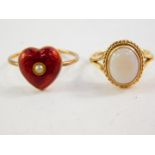 A seed pearl and red enamel heart shaped ring, on a yellow metal mount, size O, together with a