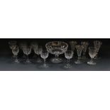 A Waterford cut glass pedestal fruit bowl, four Victorian fluted wine glasses, four glasses etched