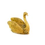 A 19thC ormolu articulated figure of a swan, cast with flowers around its neck, 9.5cm wide.