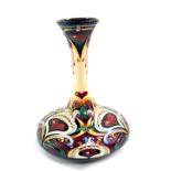 A Moorcroft limited edition pottery vase, painted in the Lassie O' My Heart pattern, designed by