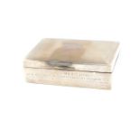 A silver cigarette box, with engine turned decoration, rectangular reserve, initial engraved,