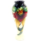 A Moorcroft pottery vase, decorated in the Anna Lily pattern, of baluster form, c1988, painted and