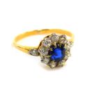A sapphire and diamond ring, set in yellow metal stamped 18ct, sapphire approx 3/4cts, diamond 0.