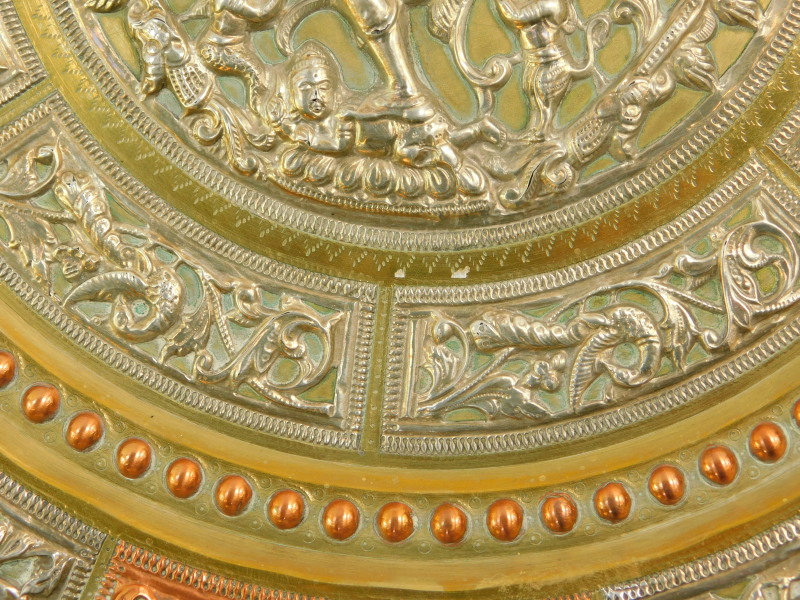 An Indian brass and damascene circular dish, embossed with a Hindu deity surrounded by panels of - Image 4 of 5