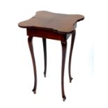 A Victorian mahogany card table, with a quartered top, raised on slender cabriole legs, 74.5cm high,