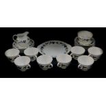 A Royal Doulton porcelain Burgundy pattern tea service, comprising bread plate, cream jug, sugar