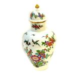 A Meissen porcelain vase and cover, kakiemon decorated with Indianische Blumen, number 482110/55,