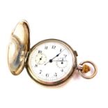 A George V silver hunter cased chronograph pocket watch, enamel dial bearing Arabic numerals, centre