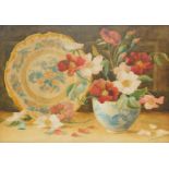 E Massingham (British, Early 20thC). Still life of wild roses and ceramics, watercolour, signed,