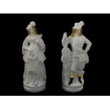 A pair of Staffordshire late 19thC pottery figures of musicians, modelled as a standing 17thC lady