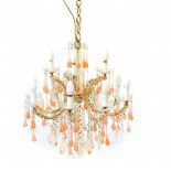 A Venetian glass twelve branch chandelier, with faceted clear glass swags and pink glass tear drops,