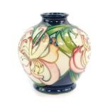 A Moorcroft pottery vase, decorated with Wisteria, of globular form, signed, limited edition 8/30,