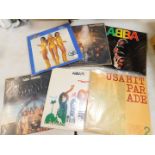 A collection of LP records, including ABBA., The Moody Blues., other rock, pop and easy