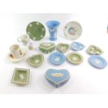 A collection of Wedgwood blue and green Jasperware, including a Queen Elizabeth II cruise liner