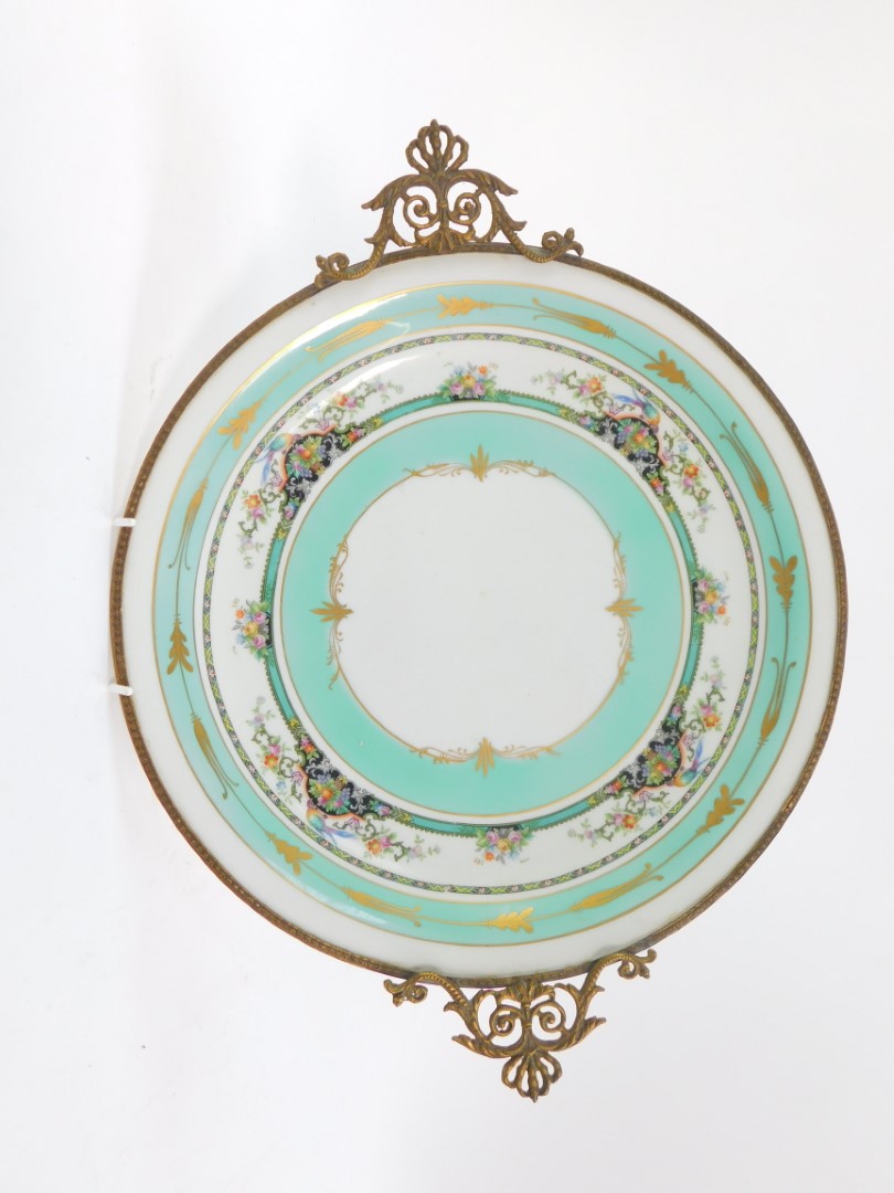 A Limoges porcelain and brass mounted circular dish, printed with flowers and birds against a - Image 4 of 5