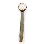 A lady's early 20thC silver cased wristwatch, circular enamel dial bearing Arabic numerals,