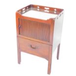 A Georgian mahogany tray top commode, with a tambour front compartment over a pull out drawer with