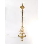 A Hart Son & Peard late 19thC oil standard lamp, converted to electricity, 164cm high.