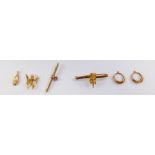 A 9ct gold Lincoln Imp bar brooch, Albert chain T bar, charm formed as Cupid, a pair of hoop