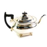 A Georgian style silver teapot, of baluster form, raised on lions paw feet, Sheffield 1967, 23.54oz.