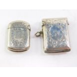 A Victorian silver vesta case, foliate engraved, shield reserve monogram engraved, Hilliard &