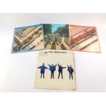 The Beatles. Two double albums, 1962-1966, and 1967-1970., together with Help! and Abbey Road. (4)