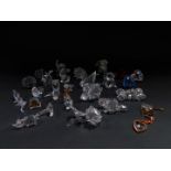 Swarovski crystal figures, including a beaver, swans and monkeys, hearts, a motor car, stemmed rose,