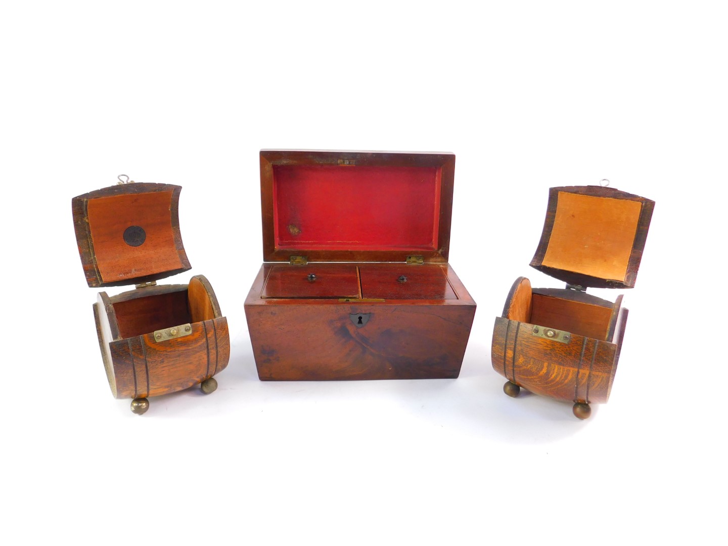 A Victorian flamed mahogany sarcophagus tea caddy, and a pair of Teopani barrel shape oak - Image 2 of 3