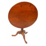 A George III mahogany bird cage tilt top occasional table, raised on a balaster turned column over