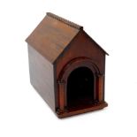 A Victorian mahogany dog kennel, of chapel form, 27cm wide, 45cm deep, 44cm high.