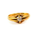 A lady's 18ct gold and diamond solitaire ring, approx 1/16ct, size K, 3.0g.