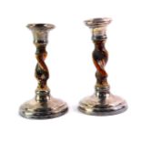 A pair of George V silver and oak barley twist loaded candlesticks, Birmingham 1927, 14.5cm high,