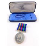 An Elizabeth II Civil Defence Long Service Medal, cased.