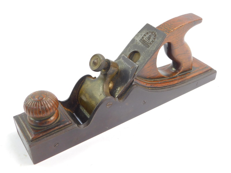 A Robert Sorby steel and brass panel plane, with a wooden handle, blade stamped Robert Sorby,