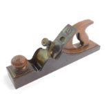 A Robert Sorby steel and brass panel plane, with a wooden handle, blade stamped Robert Sorby,