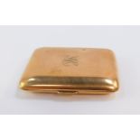 A gold plated cigarette case, monogram engraved, 8.5cm x 7cm.