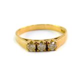 A 9ct gold and zircon three stone ring, high claw set, size L, 1.7g.