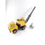 A Tonka yellow Crane, with grabber, 73cm W.