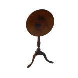 A George III mahogany tilt top occasional table, raised on a turned column over three cabriole legs,