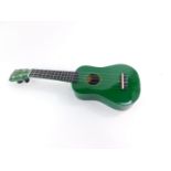 A Mahalo Soprano ukulele, No U30/GN, in green, 53cm high.