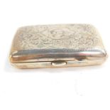 A George V silver cigarette case, of curved linear form, foliate engraved, shield reserve with