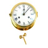 A Schatz Royal Mariner brass cased ship's clock, circular dial bearing Roman numerals, eight day