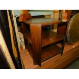 An early 20thC oak end table, with two lower shelves, 52cm high, 51cm wide, 51cm deep.