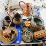 Copper and brass ware, including moose moulds, jugs, a trivet, and an incense burner. (2 trays