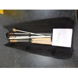 A small collection of conductor's batons in Mollard case.