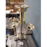 A Victorian silver plated epergne, with one tall and three short trumpets, raised on a triform base,