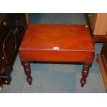 A Victorian mahogany bidet, with ceramic bowl encased in a mahogany stool, raised on turned legs,
