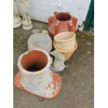Two chimney pots, together with reconstituted stone garden pots and ornaments. (9)