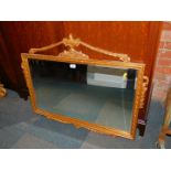 An Adam style gilt framed overmantel mirror, with bevelled plate, 98cm x 77cm.