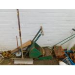 A vintage cast iron line marker, Webb manual cylinder mower together with a snow shovel. (3)